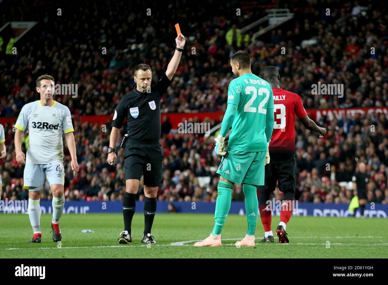Referee Stuart Attwell shows Manchester United goalkeeper Sergio Romero a  straight red card Stock Photo - Alamy