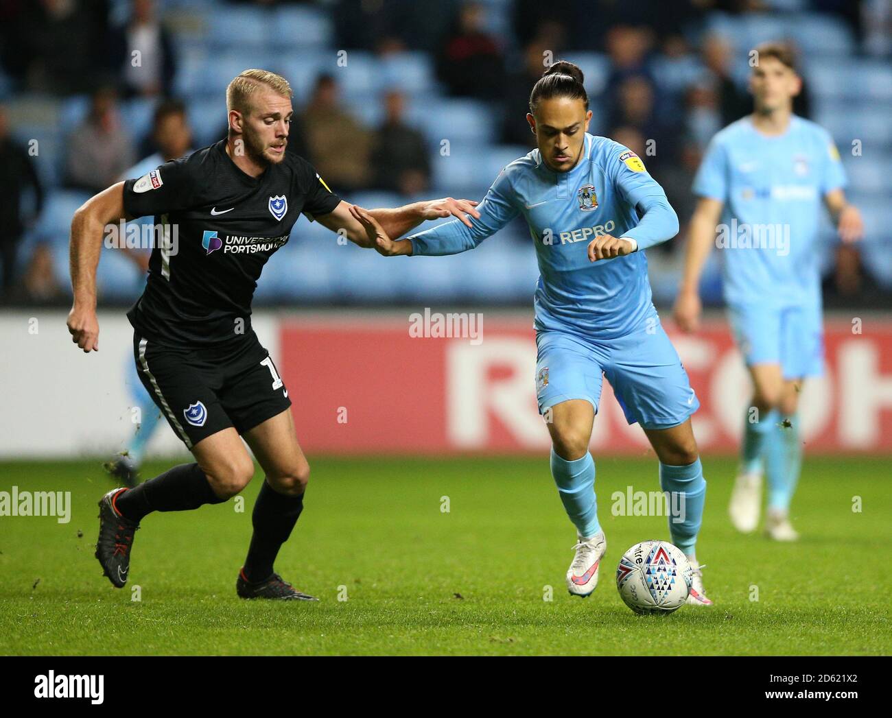 Coventry City's Jodi Jones (right) and Portsmouth's Jack Whatmough battle  for the ball Stock Photo - Alamy