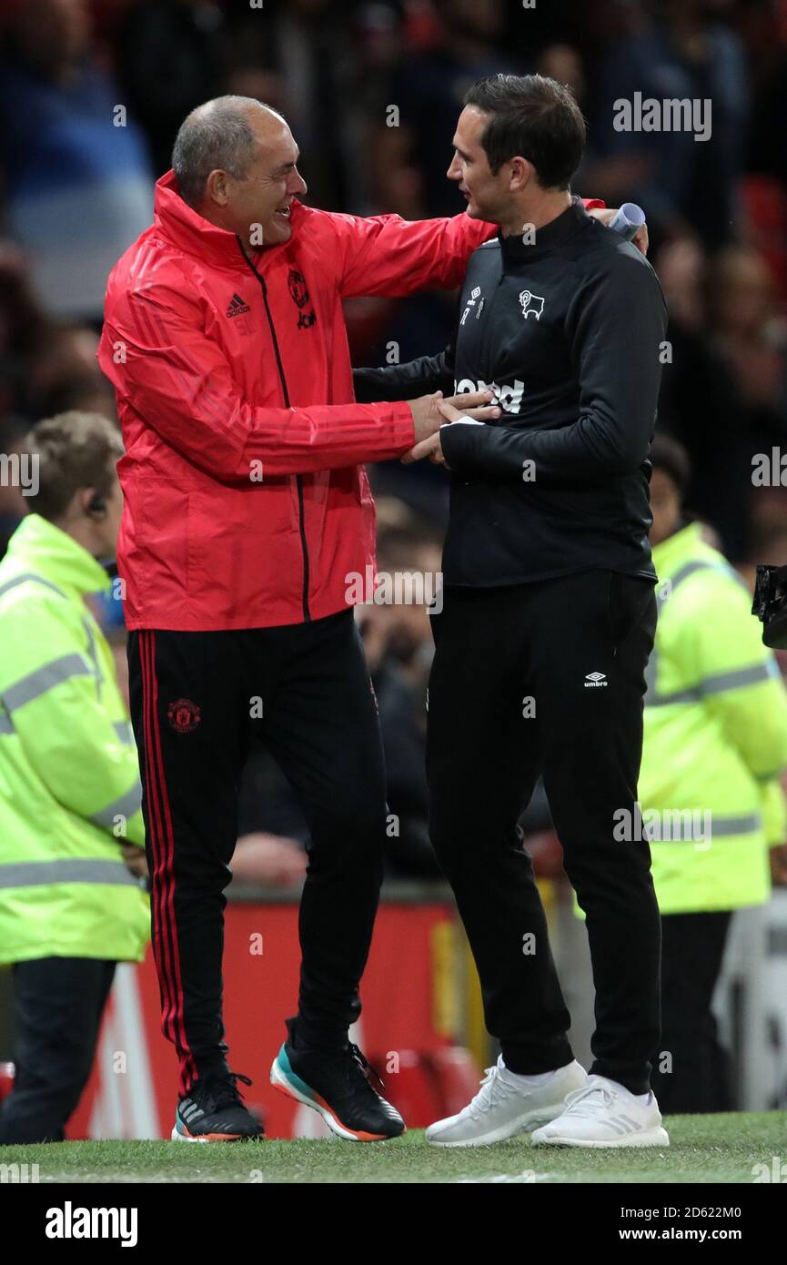 Manchester United first team coach Silvino Louro greets Derby County  manager Frank Lampard Stock Photo - Alamy