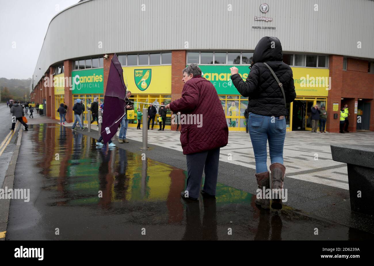 Fans make their way to Carrow Road stadium ahead of the match Stock Photo