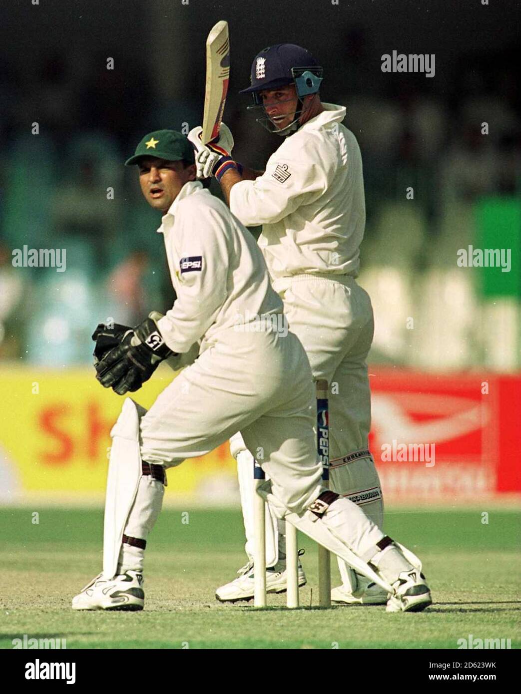 England's Graham Thorpe (r) edges a shot against Pakistan  Stock Photo