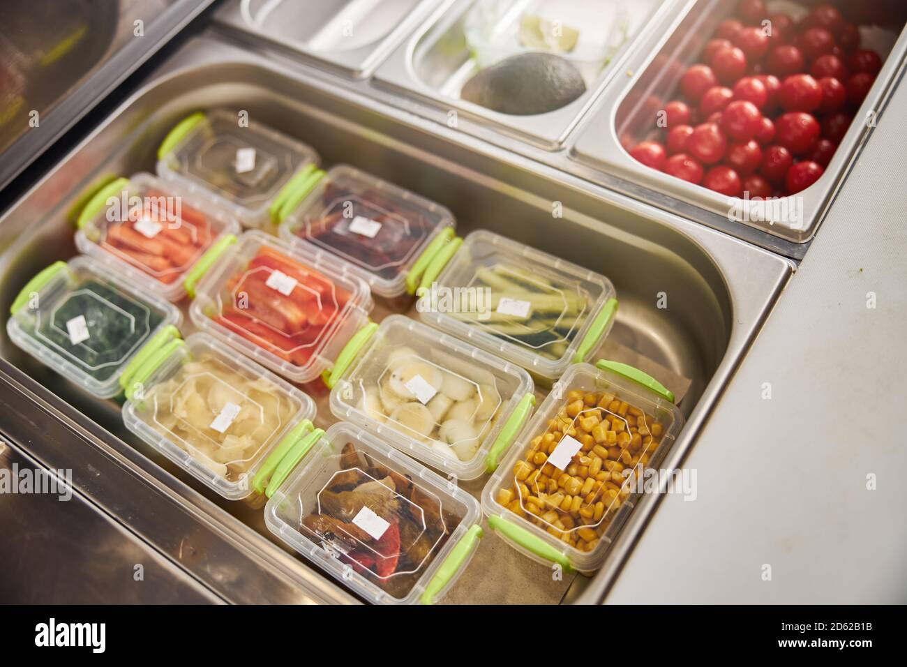 Containers with delicious fresh ingredients for pizza Stock Photo Alamy
