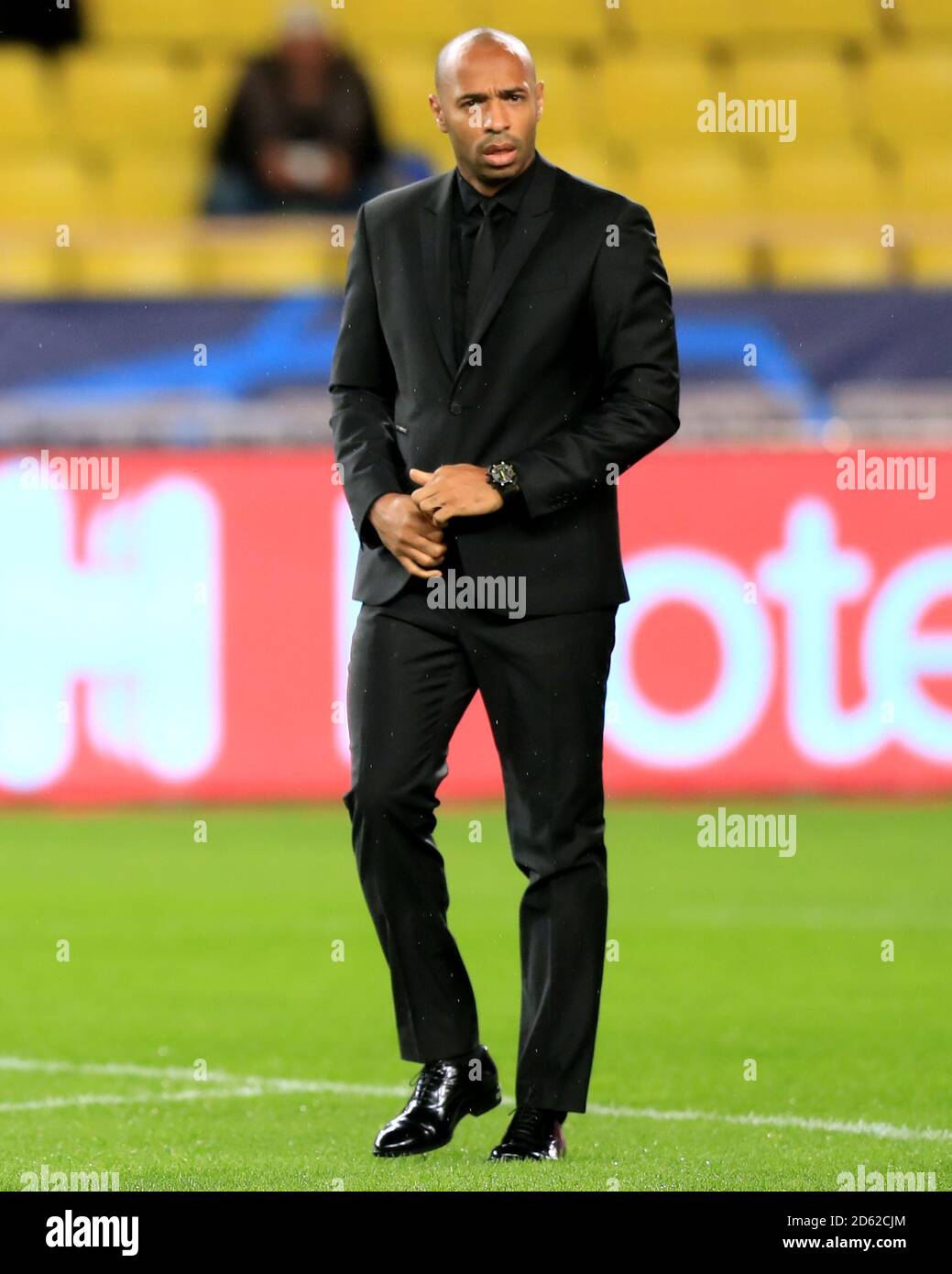 AS Monaco's Manager Thierry Henry inspects the pitch before the