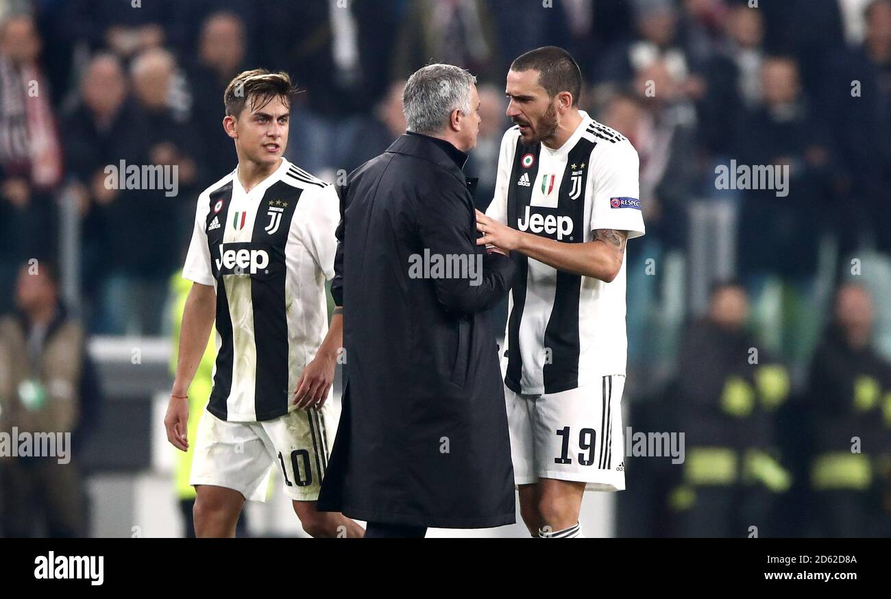 Manchester United manager Jose Mourinho (left) argues with Juventus' Leonardo Bonucci (right) Stock Photo