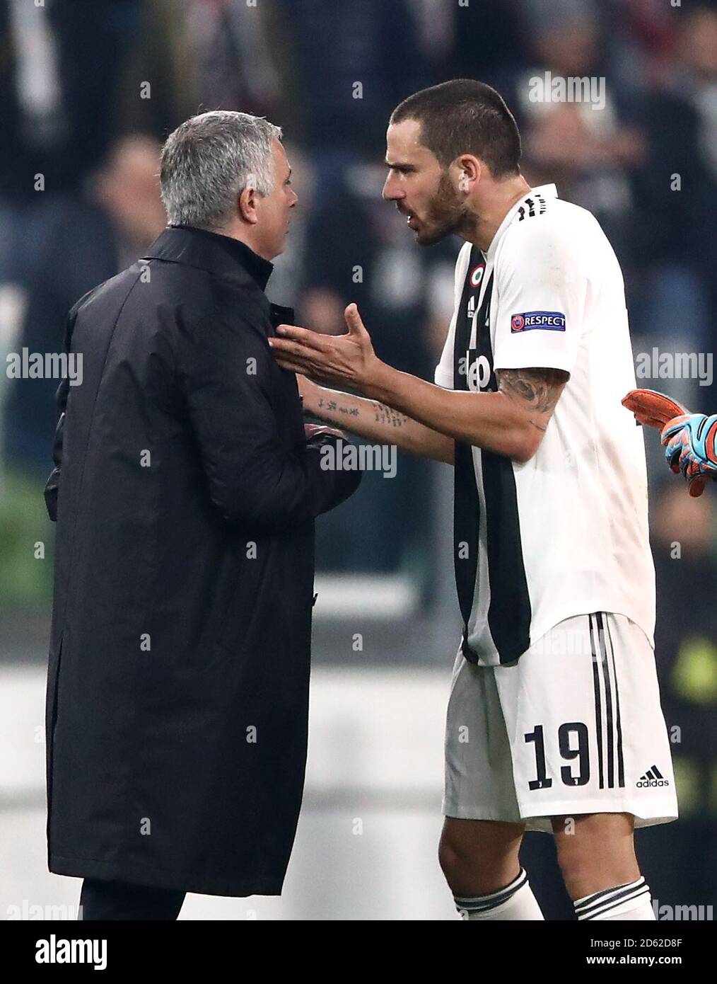 Manchester United manager Jose Mourinho (left) argues with Juventus' Leonardo Bonucci Stock Photo