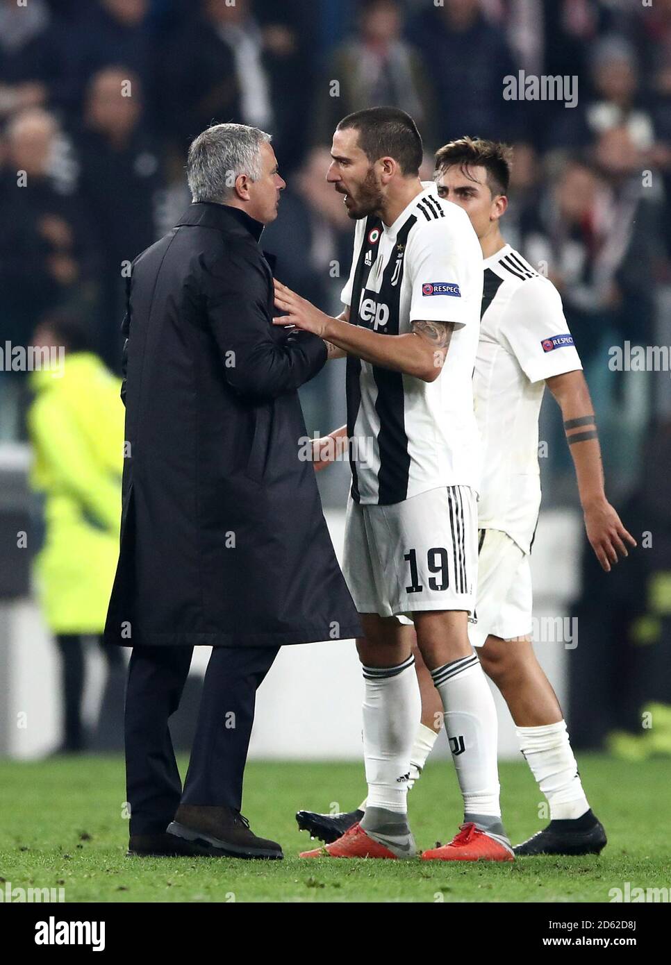 Manchester United manager Jose Mourinho (left) argues with Juventus' Leonardo Bonucci after the final whistle Stock Photo