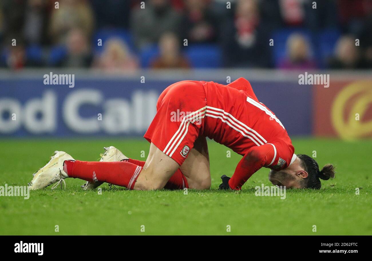 Wales' Gareth Bale appears injured after taking a knock Stock Photo - Alamy