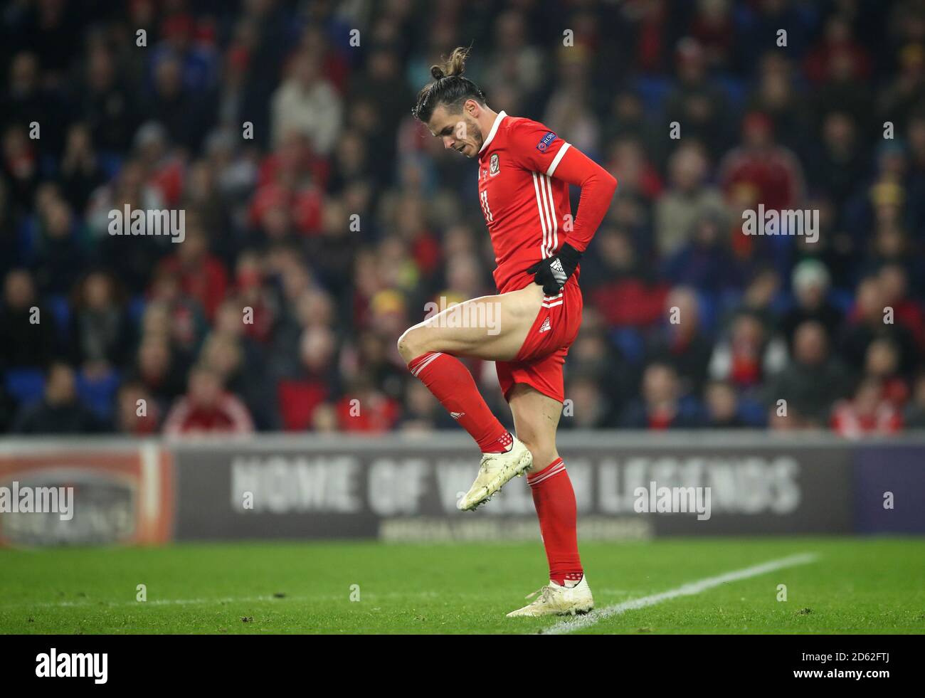Wales' Gareth Bale appears injured after taking a knock Stock Photo - Alamy