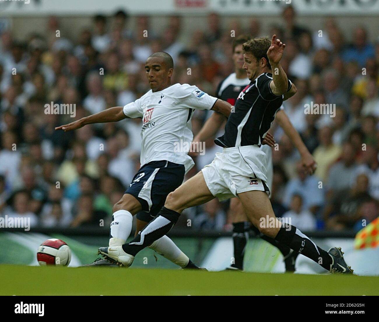 Fulham's Moritz Volz and Tottenham Hotspur's Benoit Assou-Ekotto Stock Photo