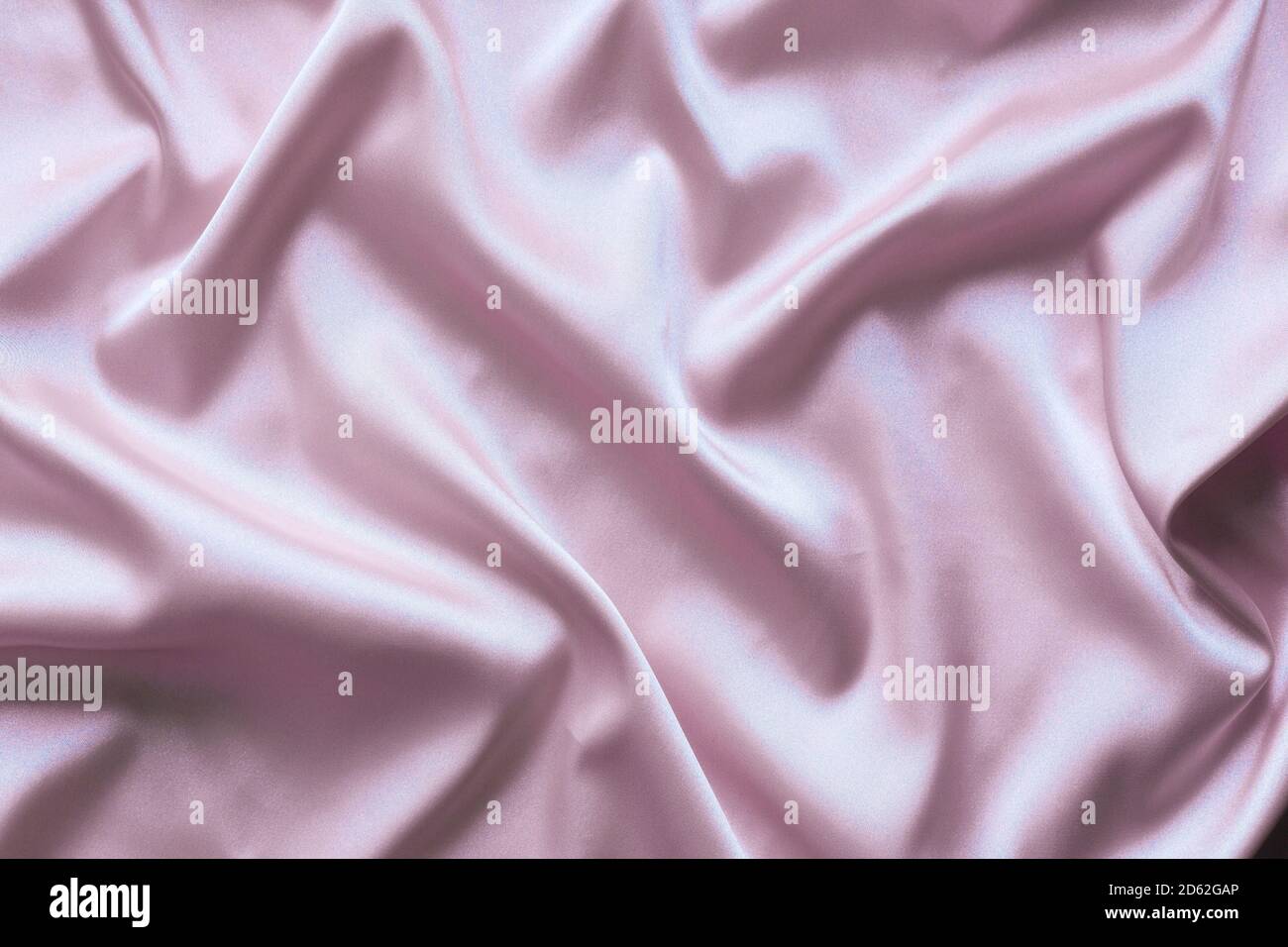 Smooth elegant pink silk with soft folds can be used as background ...