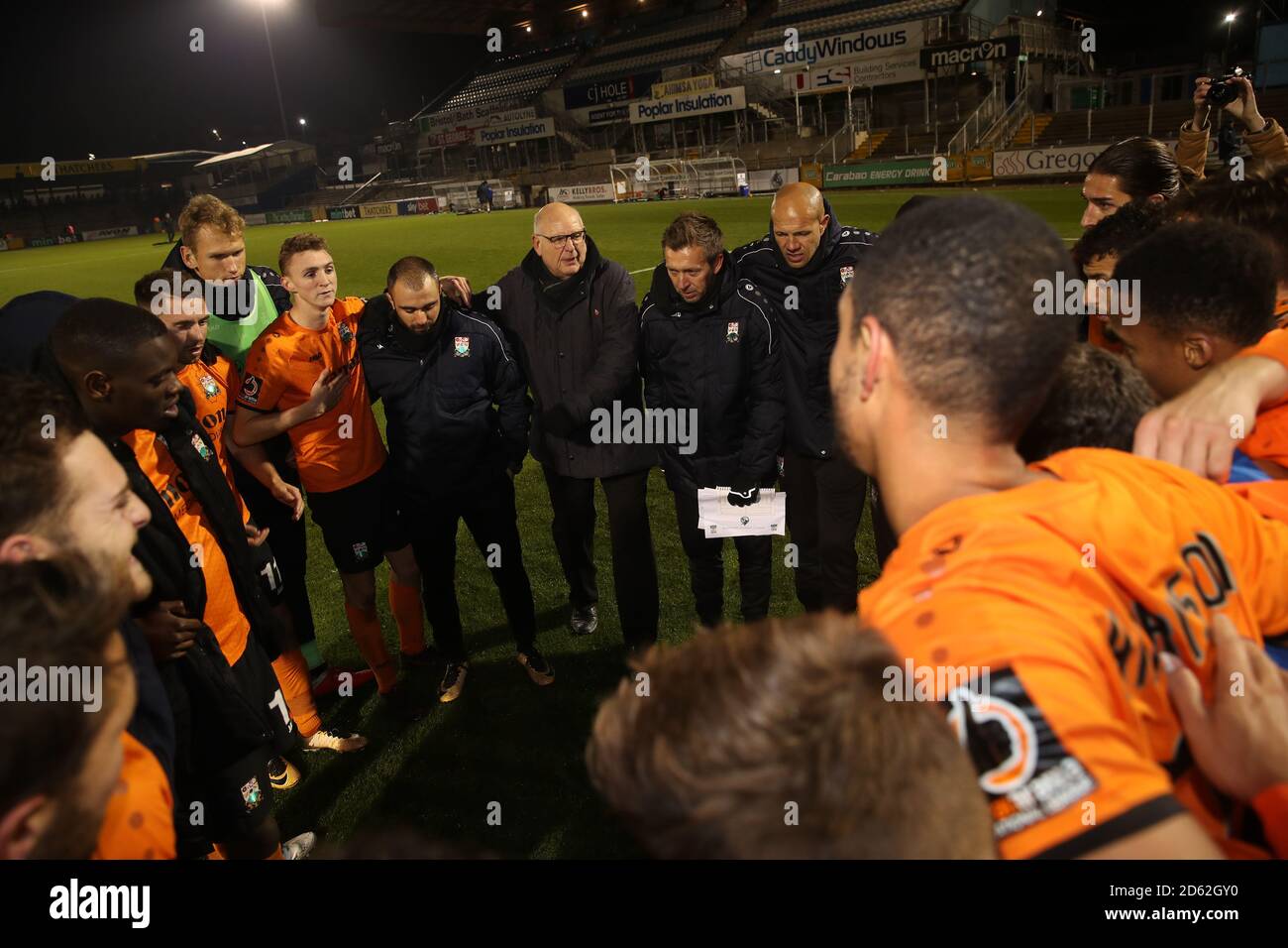 Manager John Still talks to his players after the final whistle