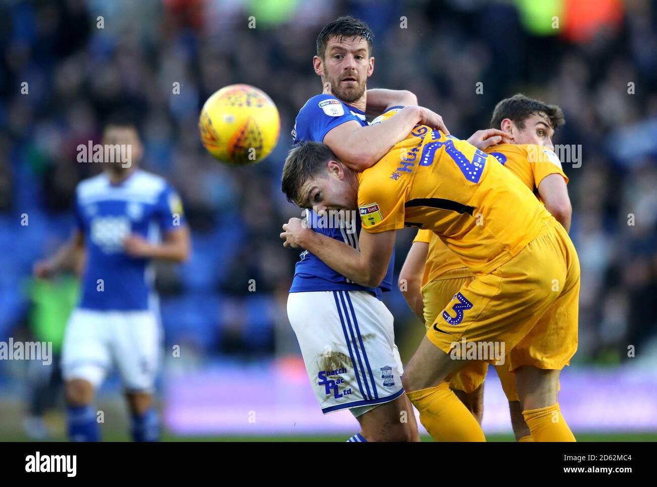 Birmingham City's Lukas Jutkiewicz (centre) and Preston North End's Paul Huntington battle for the ball Stock Photo