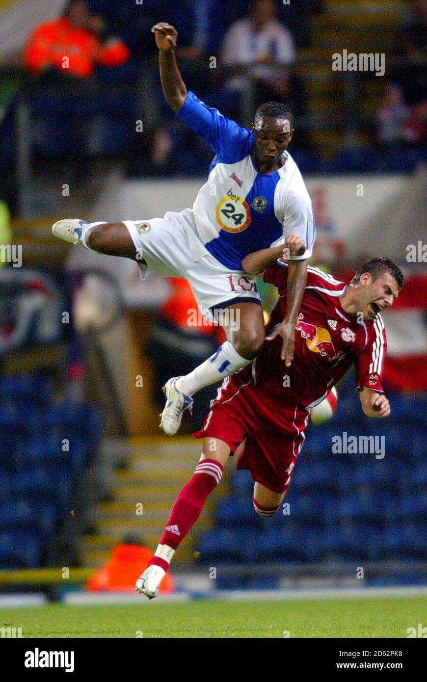 Blackburn Rovers' Benedict McCarthy and SV Salzburg's Milan Dudic battle for the ball Stock Photo