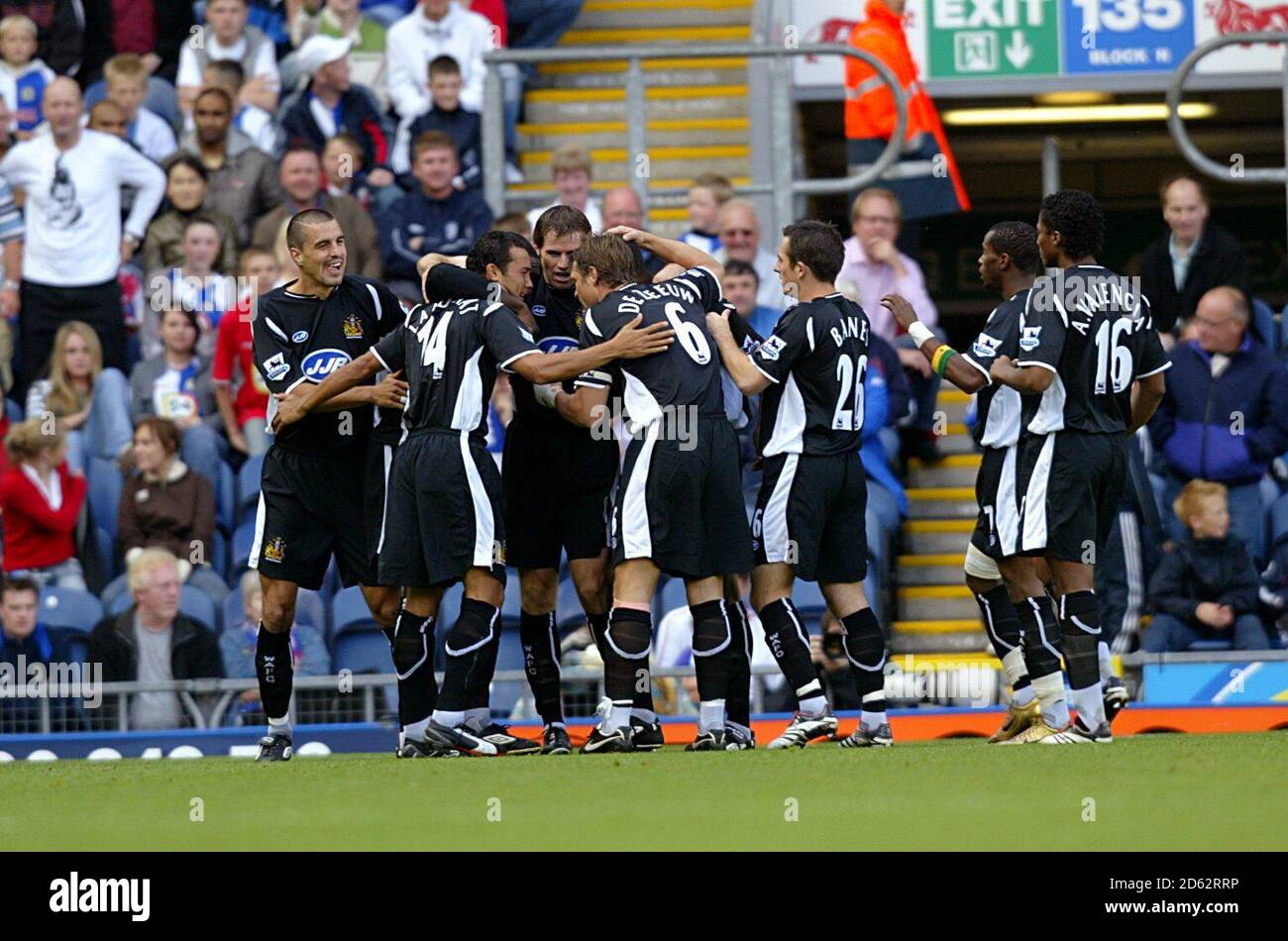 Wigan's Emile Heskey celebrates his goal with his team mates  Stock Photo