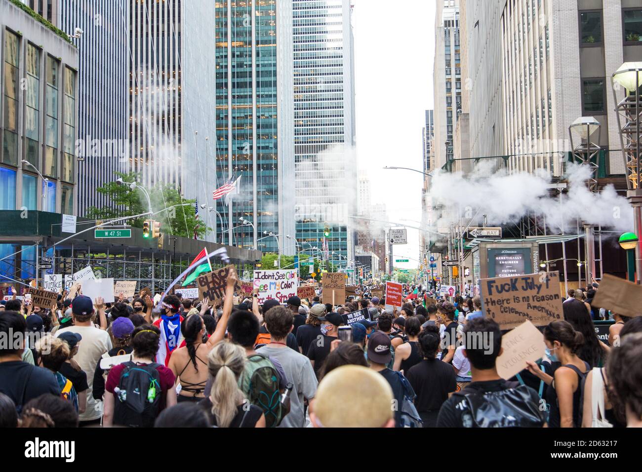 Crowd of Protesters with Signs during Juneteenth March, 6th Avenue, Midtown, New York City, New York, USA Stock Photo