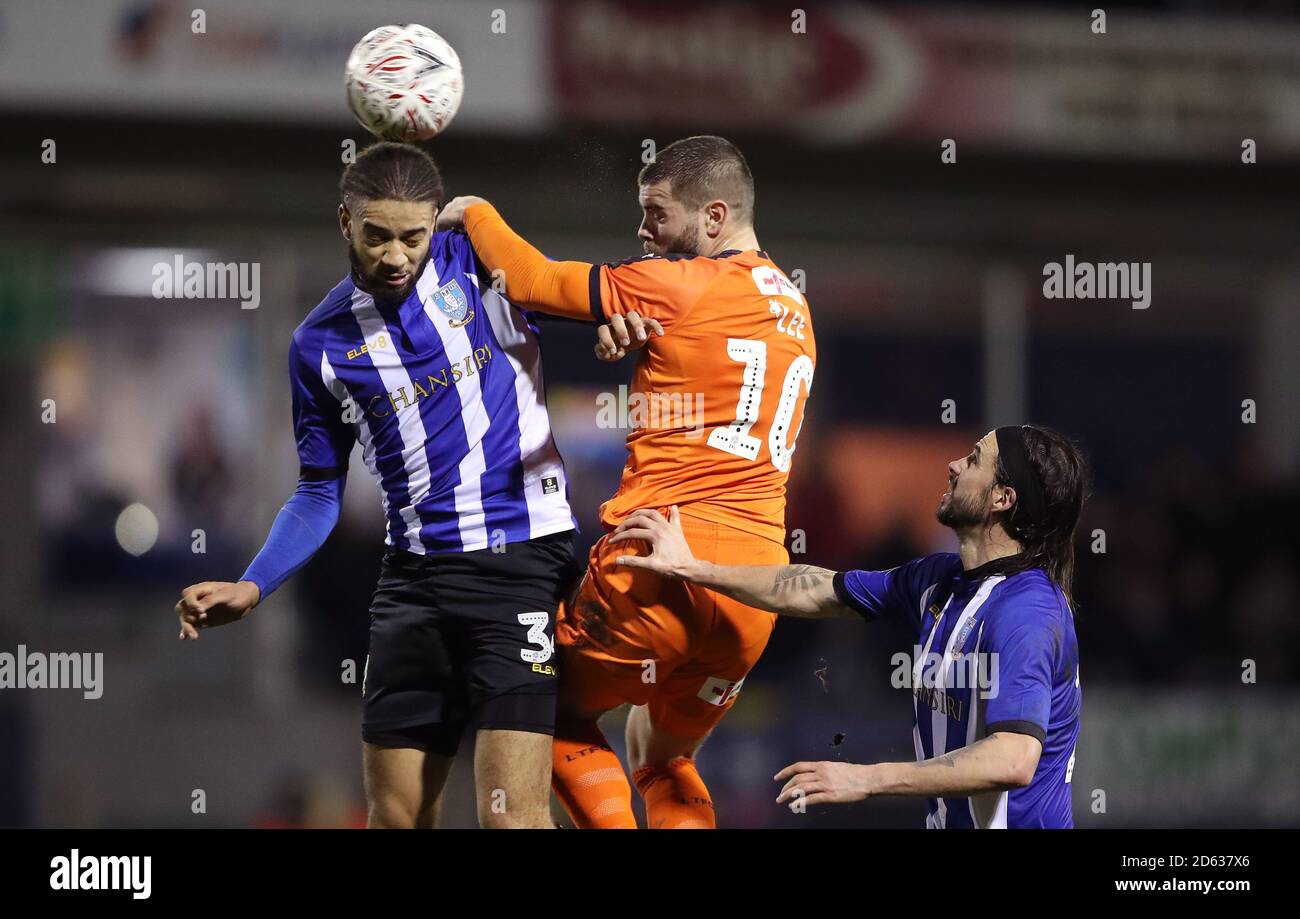 Sheffield Wednesday's Michael Hector, Luton Town's Eliot Lee and Sheffield Wednesday's George Boyd battle for the ball Stock Photo