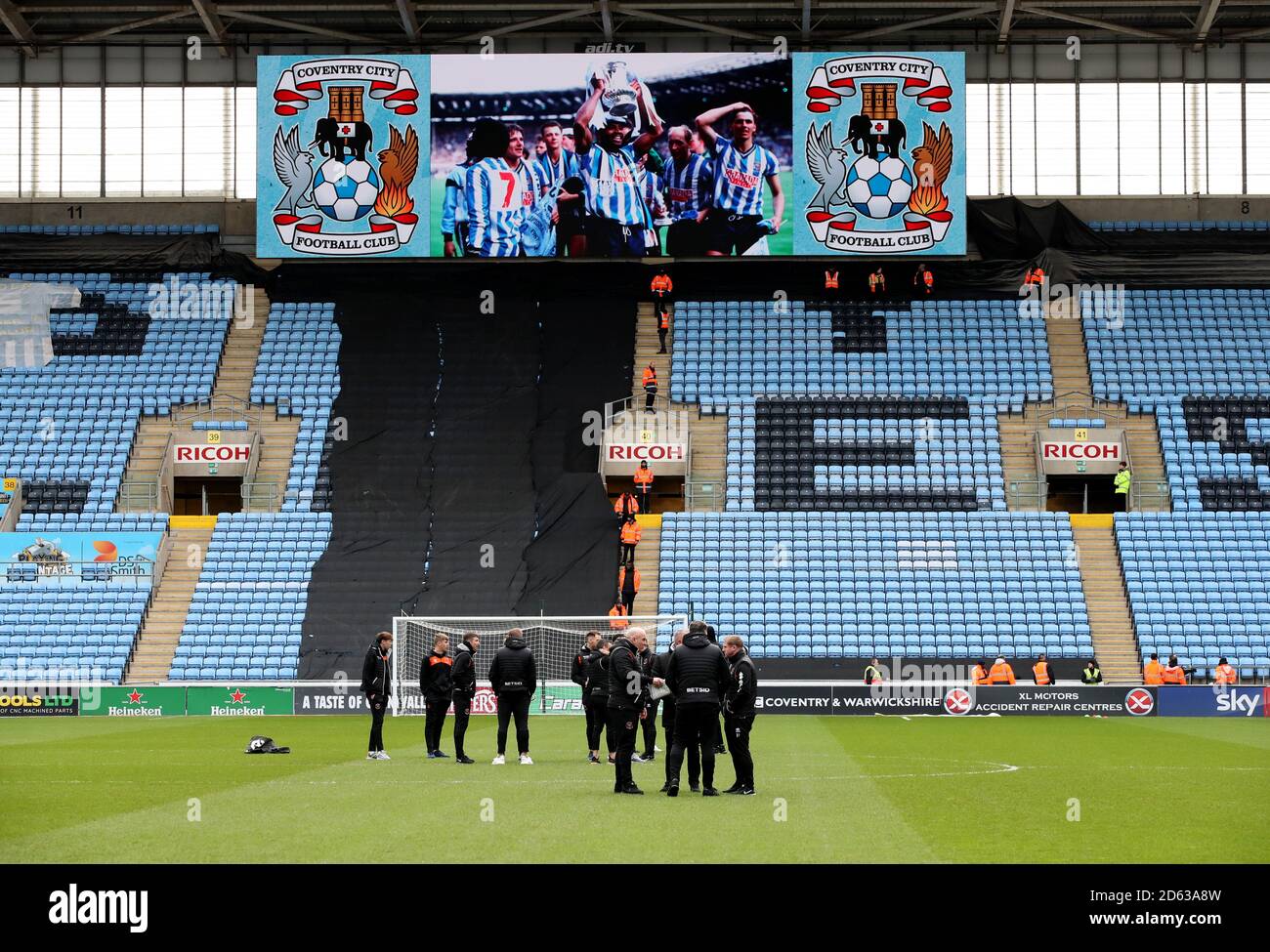Blackpool players inspect the pitch ahead of the Sky Bet League One match at the  Ricoh Arena Coventry Stock Photo