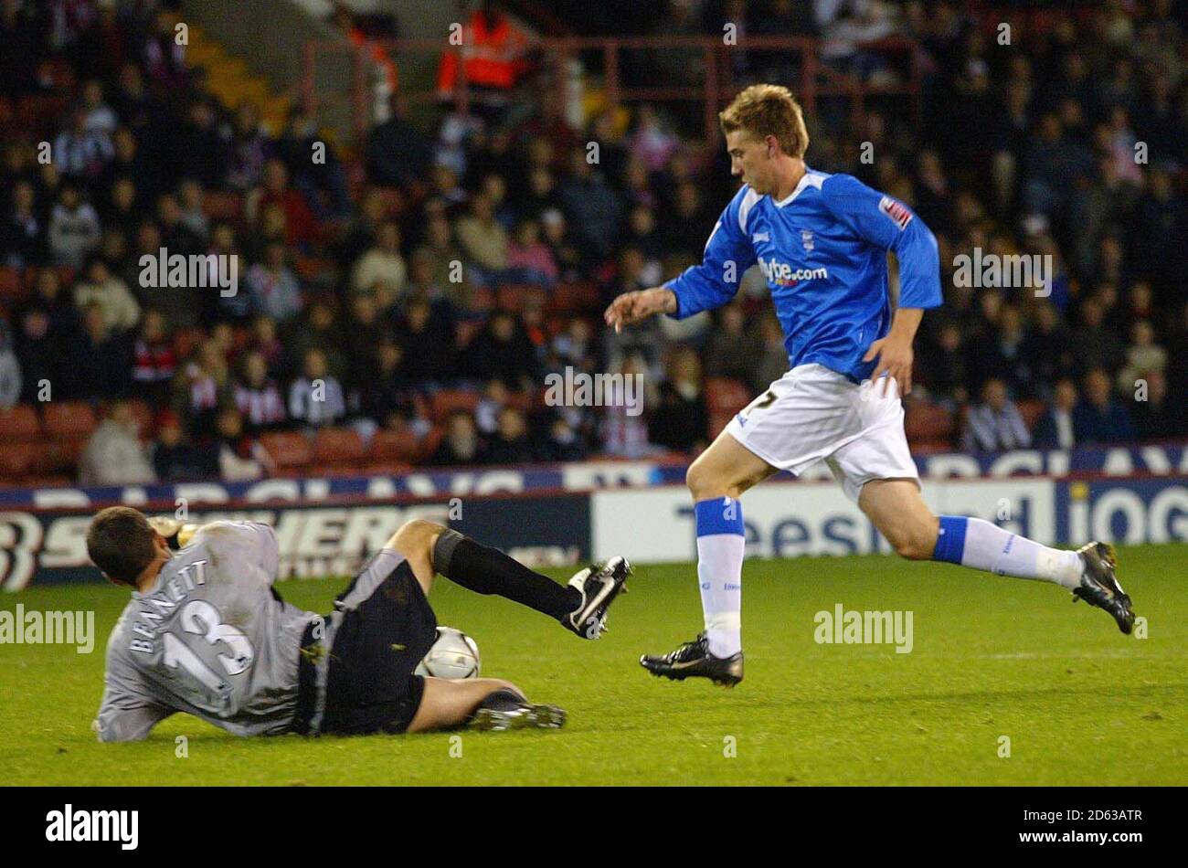 Birmingham City's Nicklas Bendtner rounds Sheffield United's keeper Ian Bennett to score the 2nd goal Stock Photo
