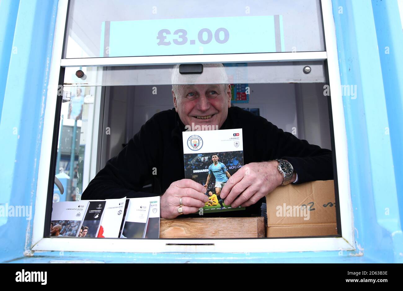 A vendor sells match day programmes hi-res stock photography and images ...
