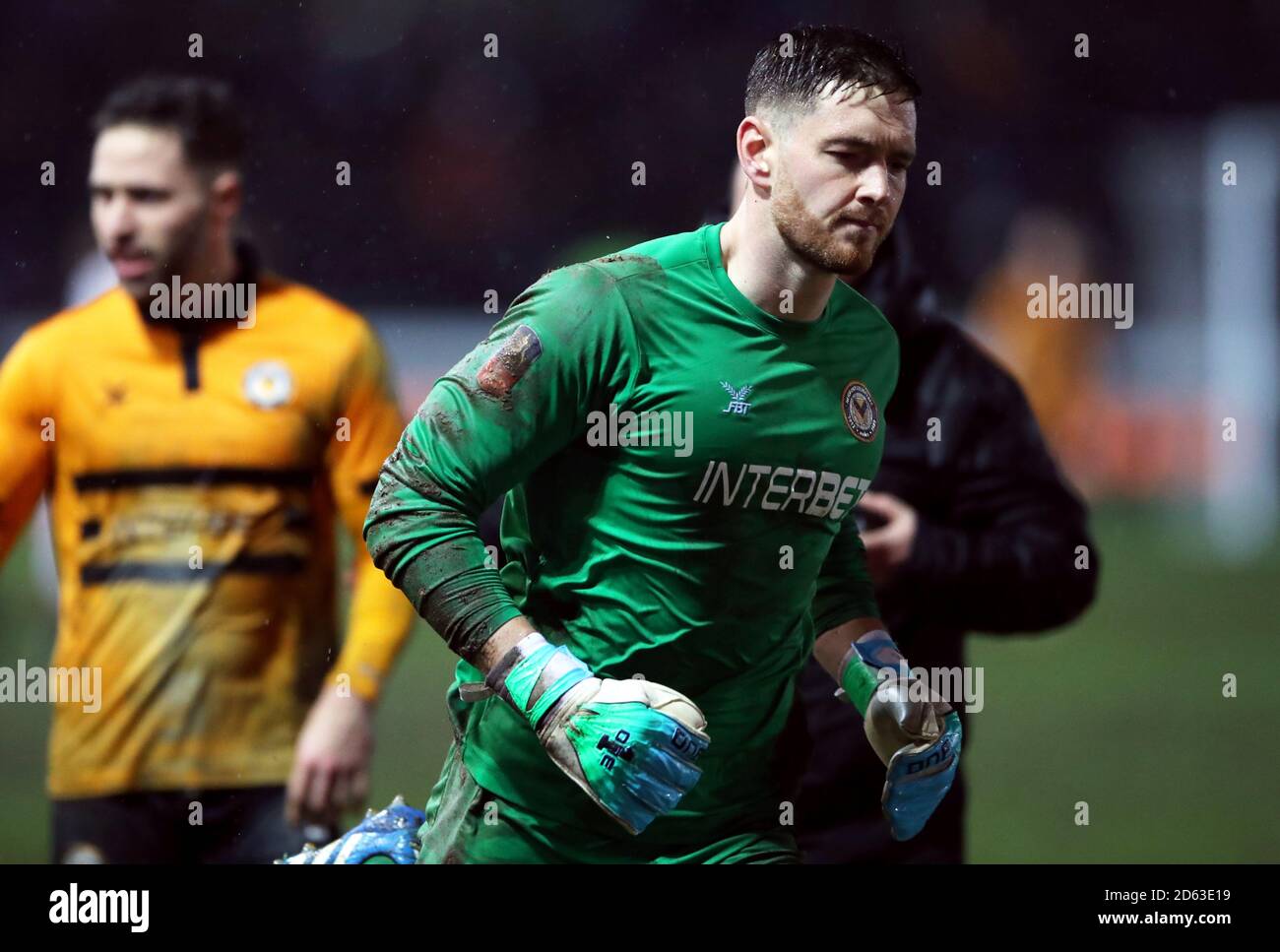 Newport County goalkeeper Joe Day leaves the pitch at full time after ...