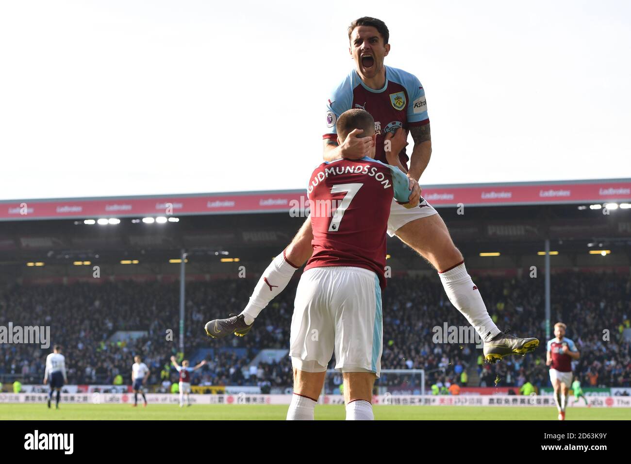Burnley's Robbie Brady (right) and Burnley's Johann Gudmundsson celebrate as Ashley Barnes (not pictured) celebrates scoring his side's second goal of the game Stock Photo