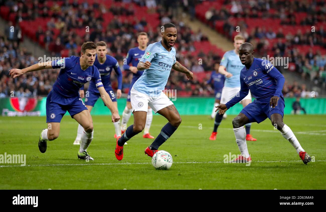 Manchester City's Raheem Sterling (centre) in action Stock Photo