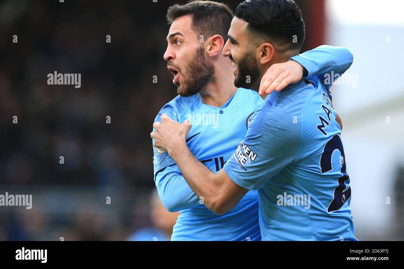 Manchester City's Riyad Mahrez (right) celebrates scoring his side's