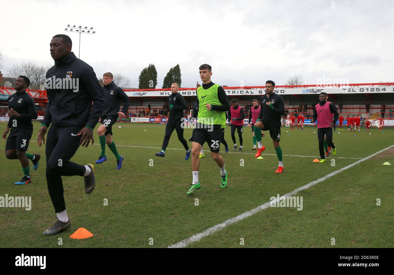 Coventry City players warm up ahead of the match  Stock Photo