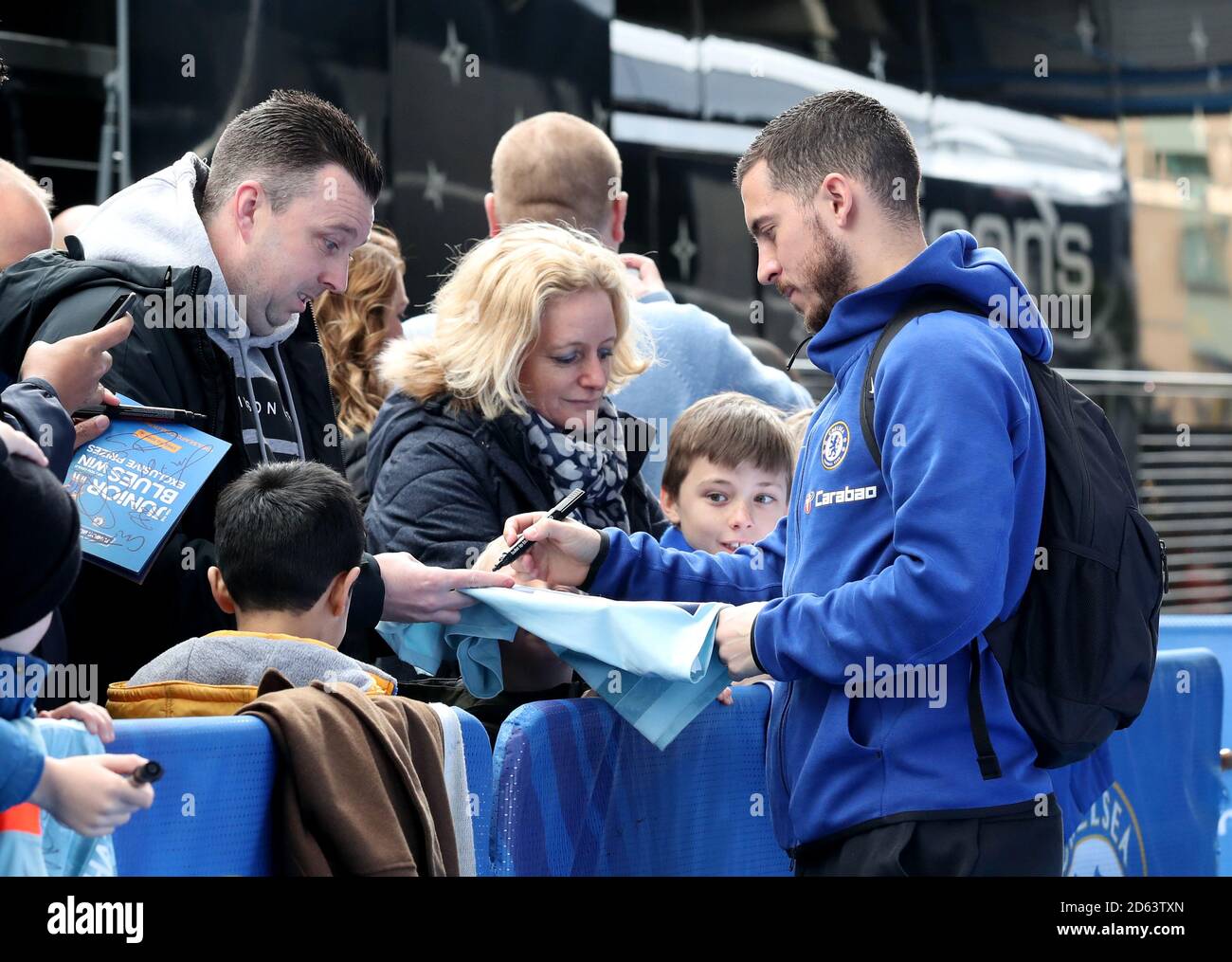 Chelsea's Eden Hazard signs for fans as he arrives ahead of the match Stock  Photo - Alamy