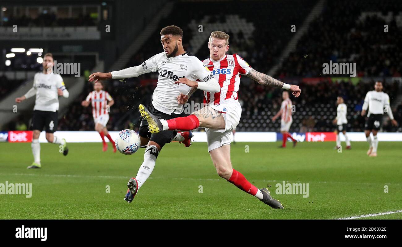 Derby County's Jayden Bogle (left) and Stoke City's James McClean battle for the ball Stock Photo
