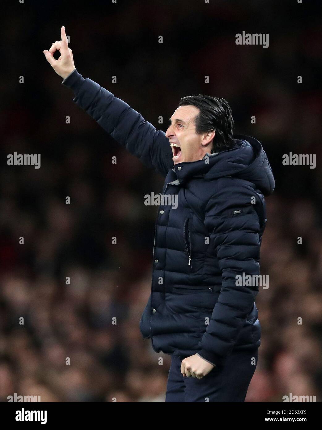 Arsenal manager Unai Emery gestures on the touchline Stock Photo