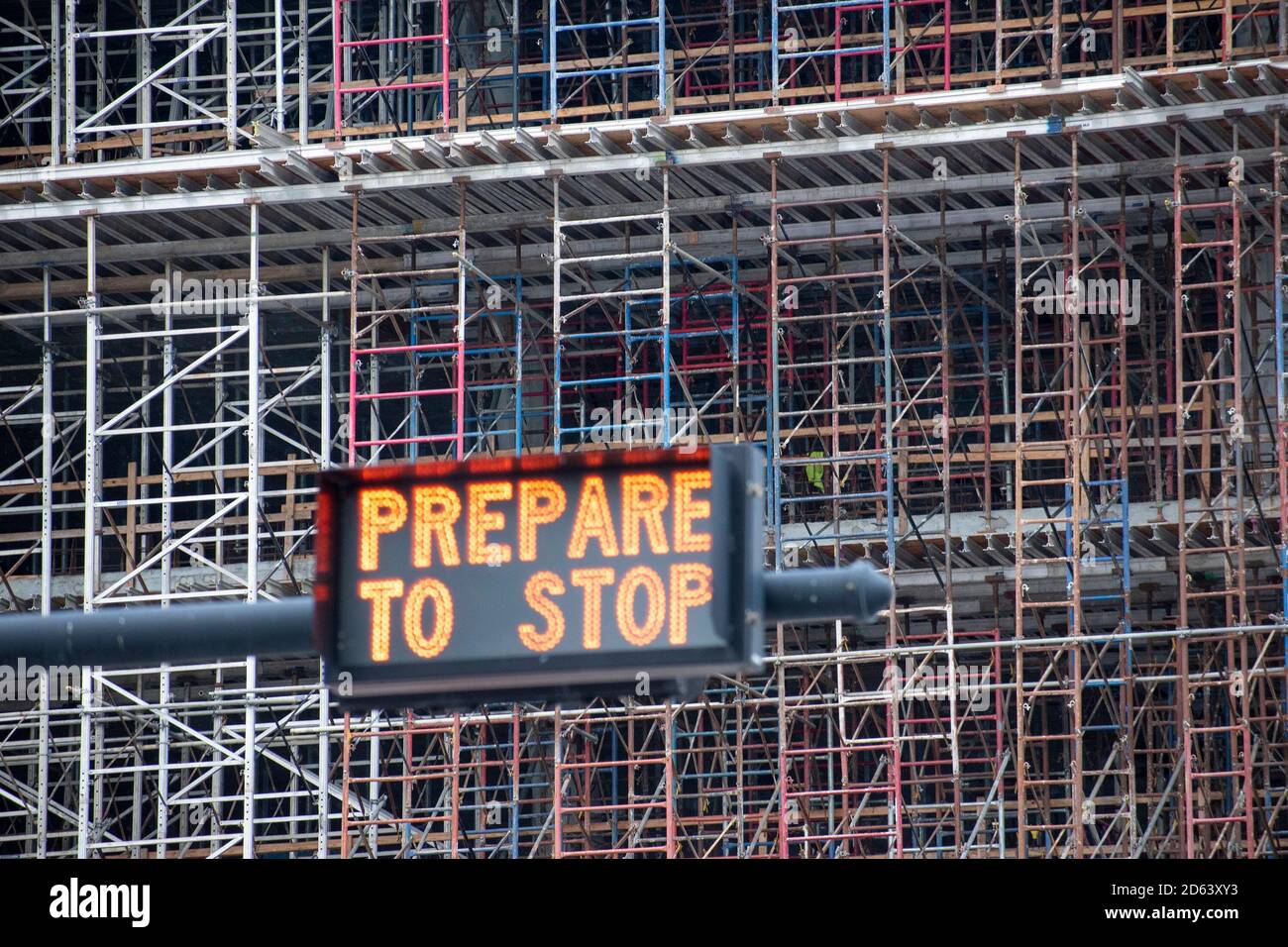 Scaffolding covering a building under renovation Stock Photo