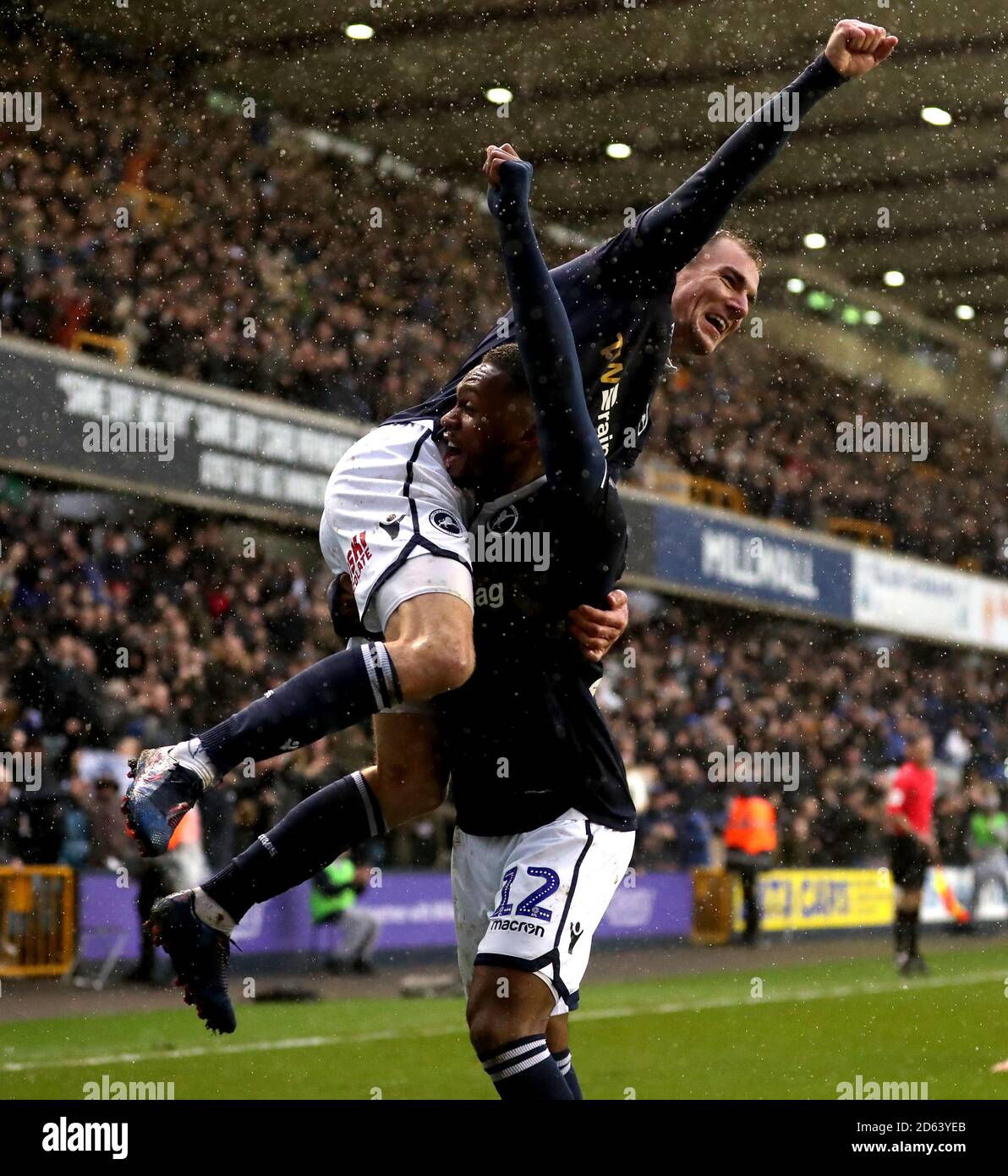 Millwall's Jed Wallace and Mahlon Romeo celebrate after their side go 2