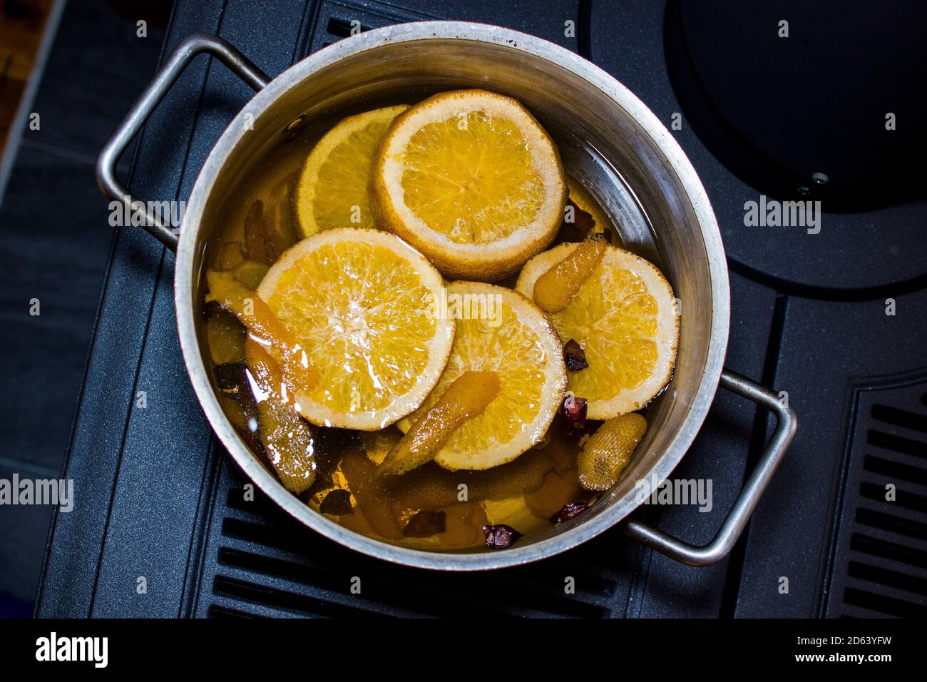 Pot of Oranges on Top of Fire Place for Fall Stock Photo