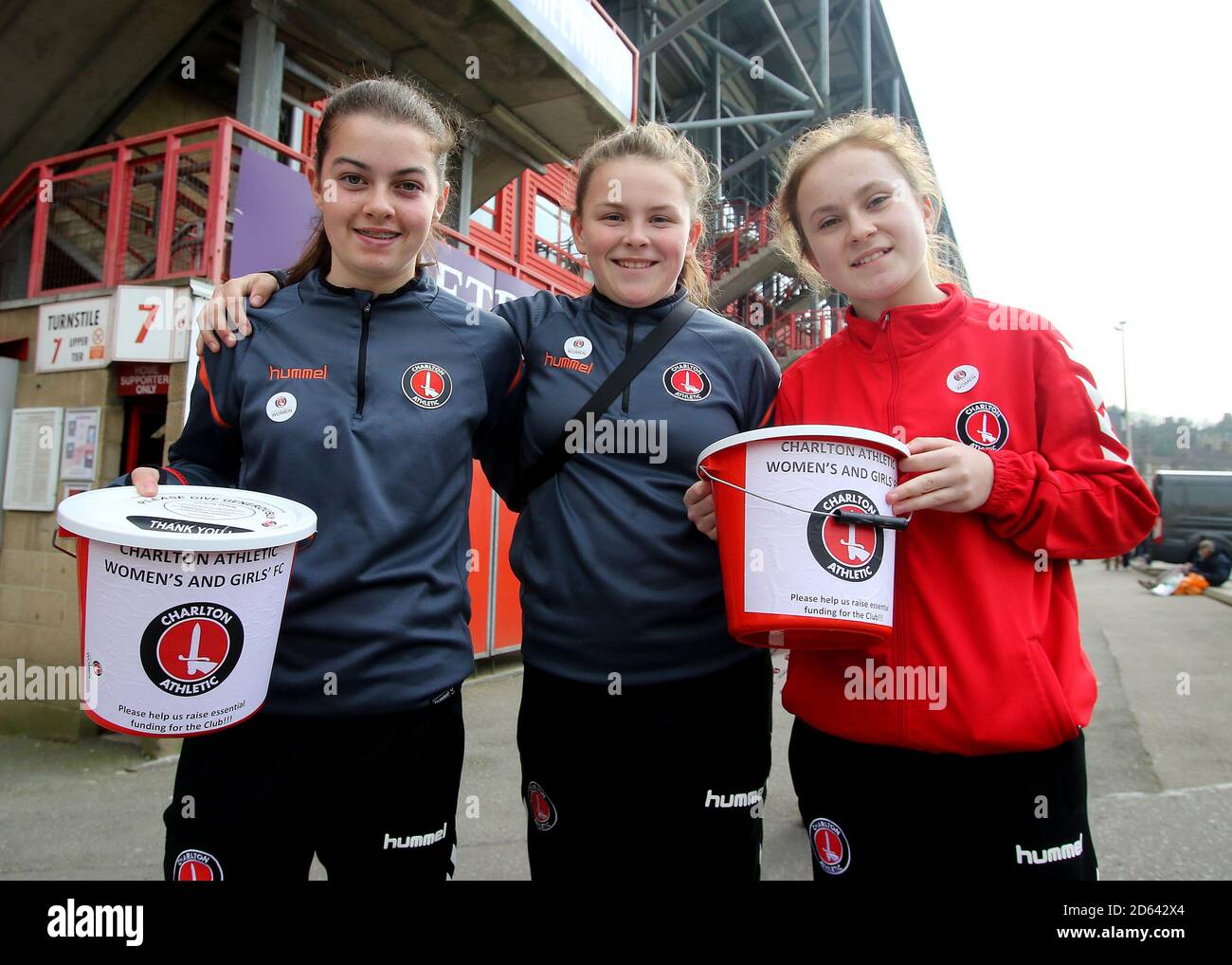 Members of the women team collect for charity before the match Stock Photo