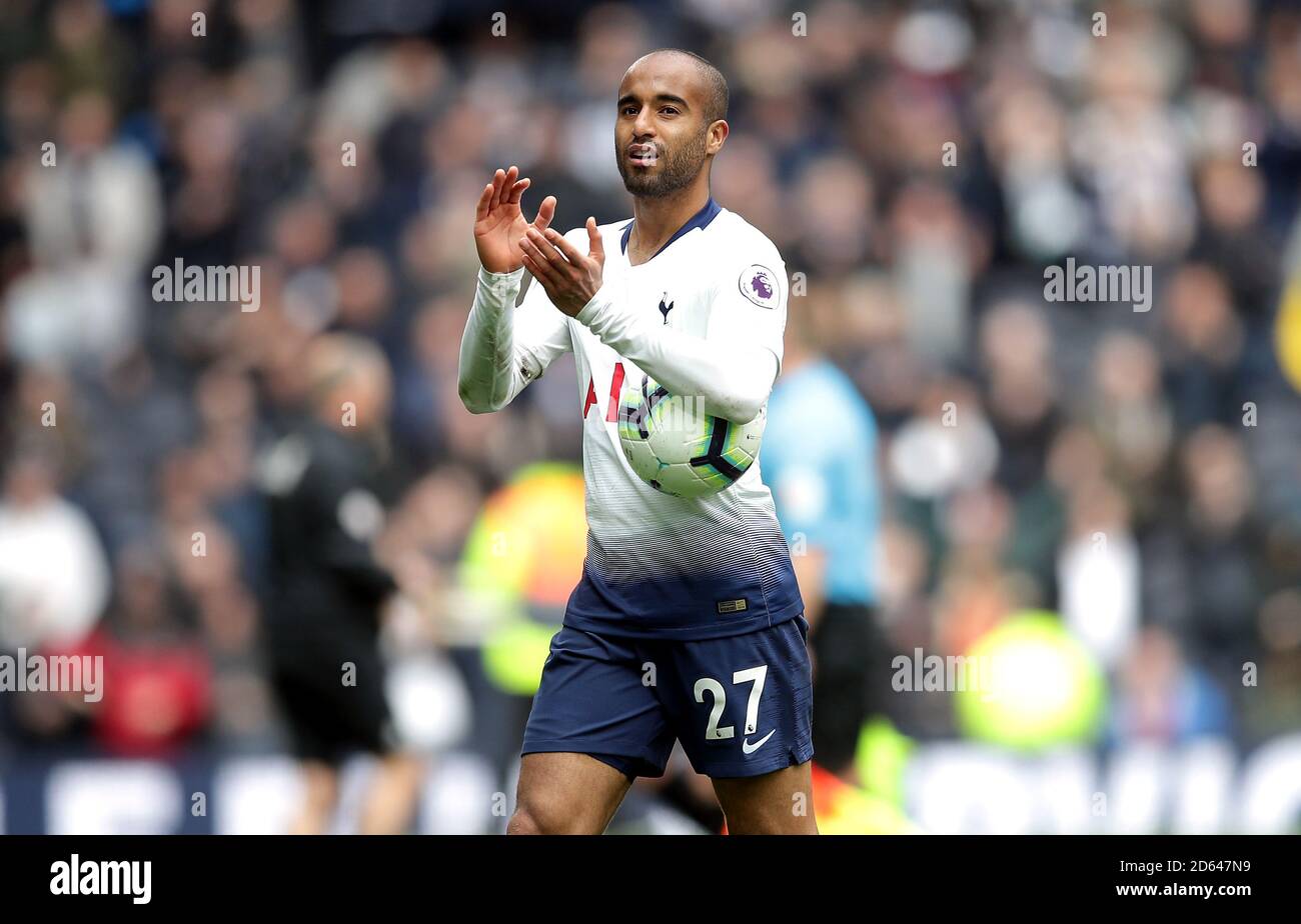Tottenham Hotspur's Lucas Moura celebrates with the match ball after scoring a hat-trick after the final whistle Stock Photo