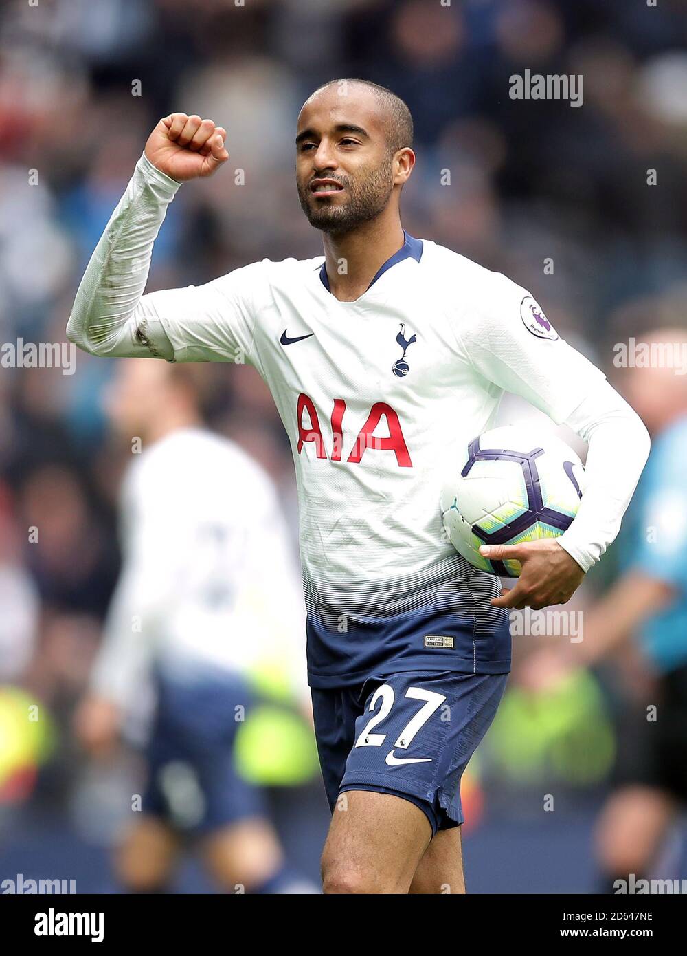 Tottenham Hotspur's Lucas Moura celebrates with the match ball after scoring a hat-trick after the final whistle Stock Photo