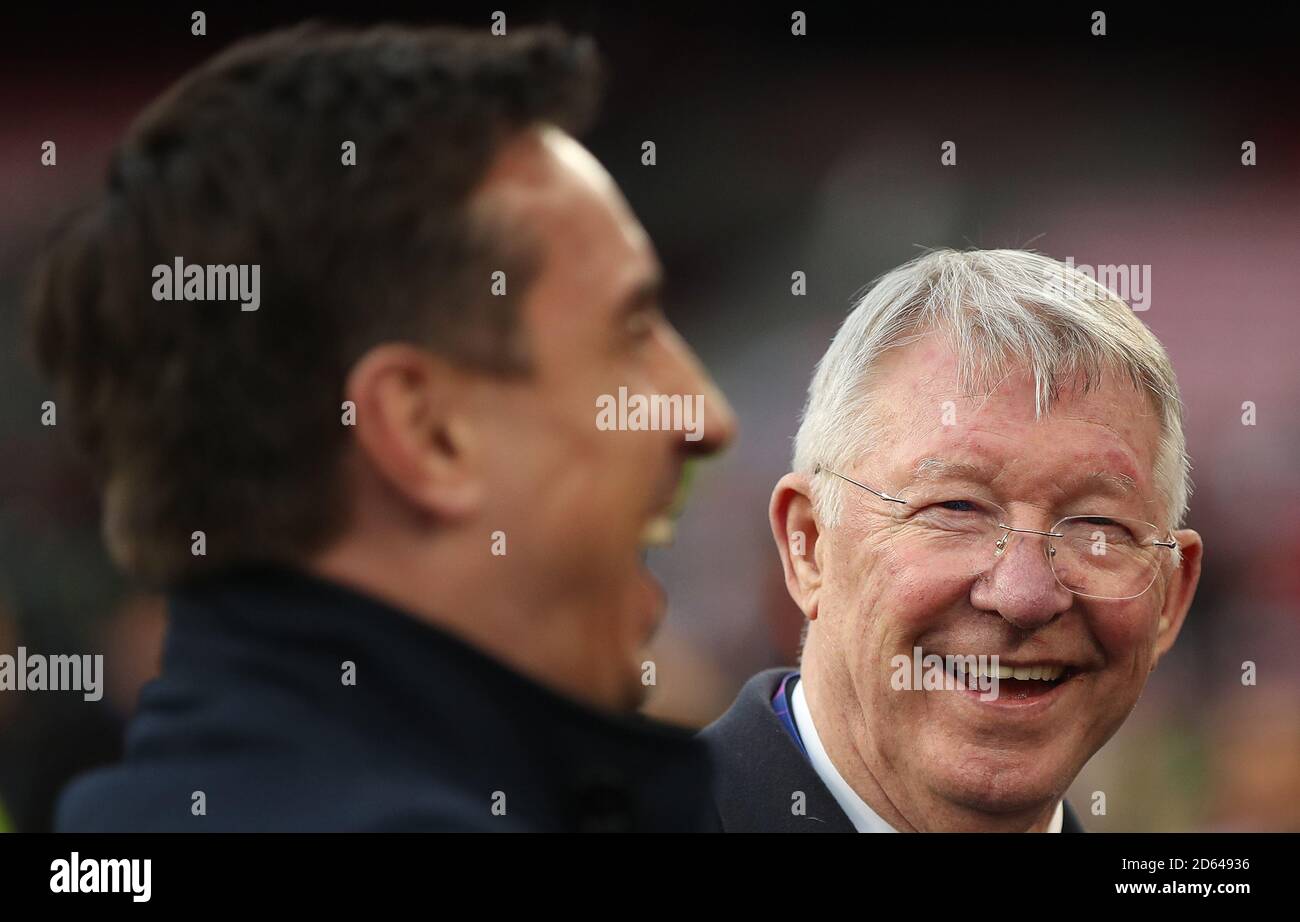Gary Neville and Sir Alex Ferguson share a joke before kick off Stock ...