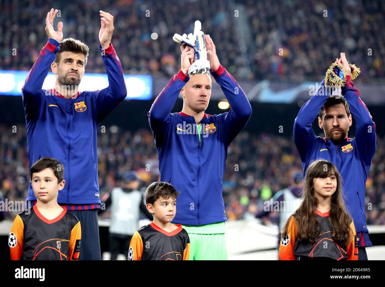 Barcelona's Gerard Pique, Marc-Andre ter Stegen and Lionel Messi applaud  the fans prior to the beginning of the match Stock Photo - Alamy