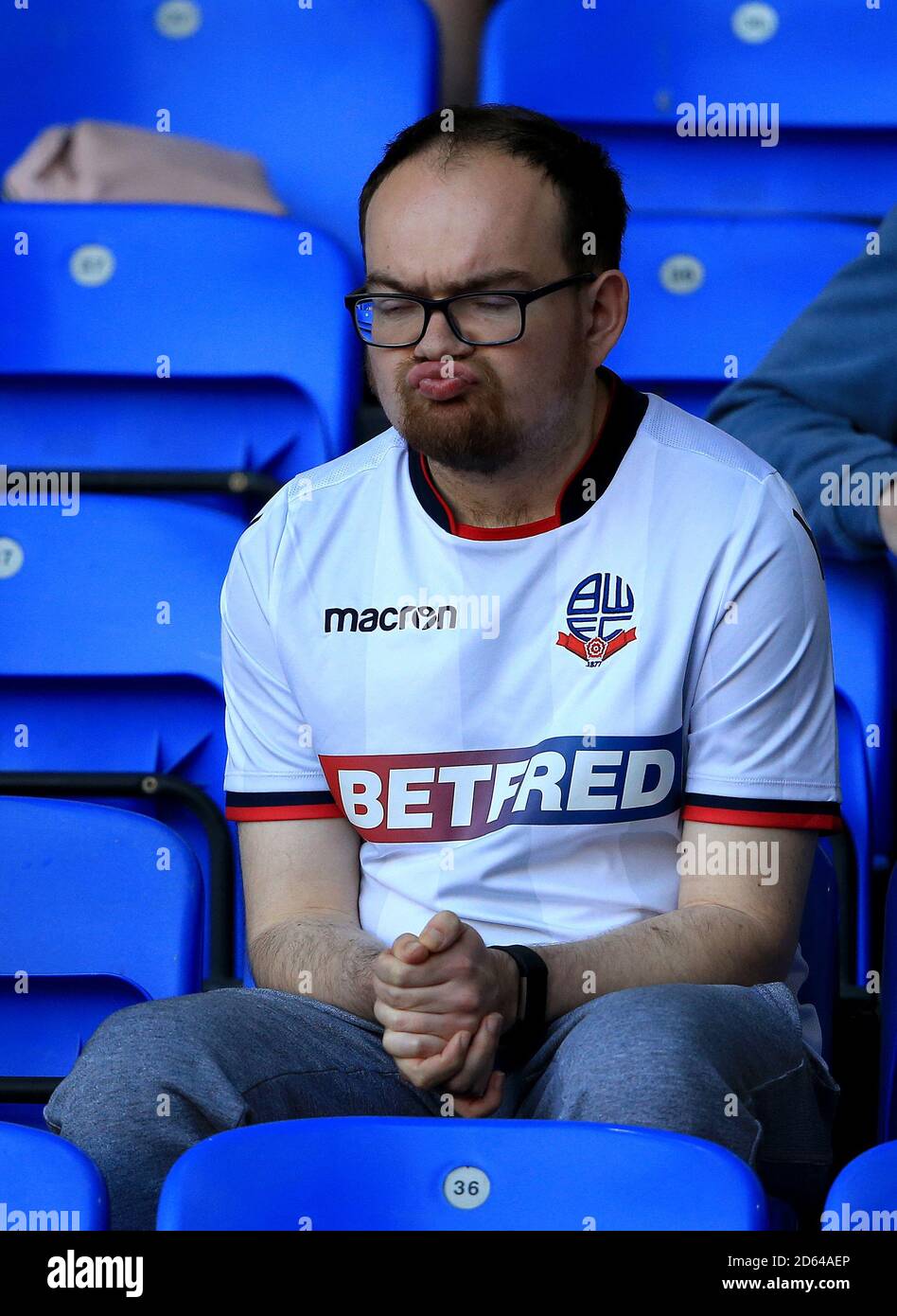 A Bolton Wanderers' fan shows their dejection at end of the as their team are relegated from Sky Championship Stock Photo - Alamy