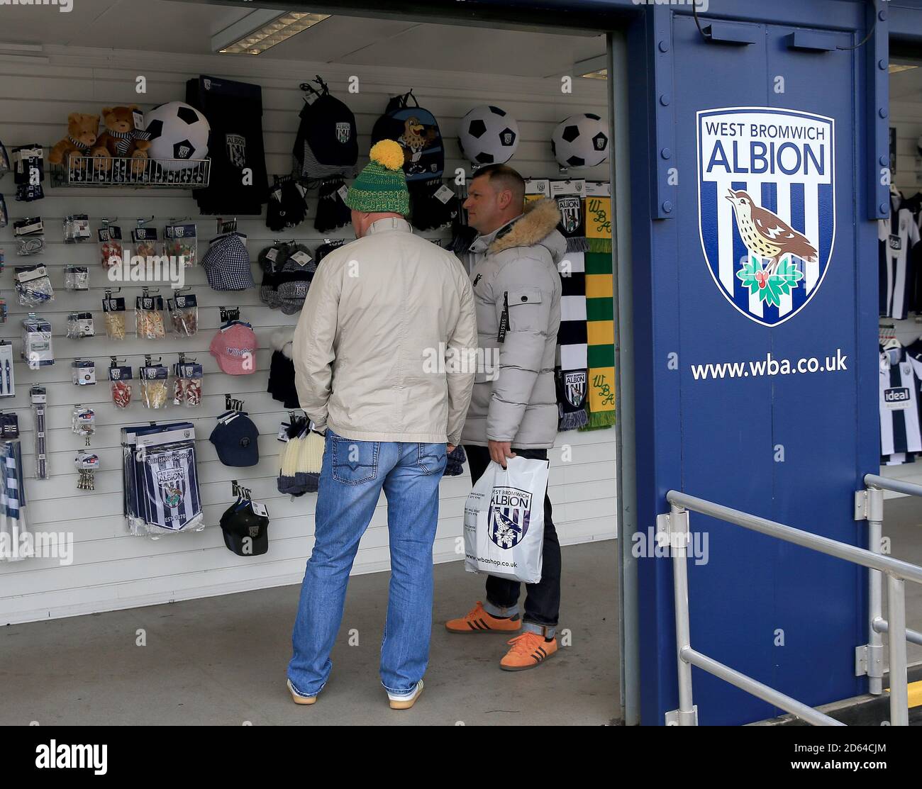 West Bromwich Albion fans browse merchandise in the club shop Stock Photo -  Alamy