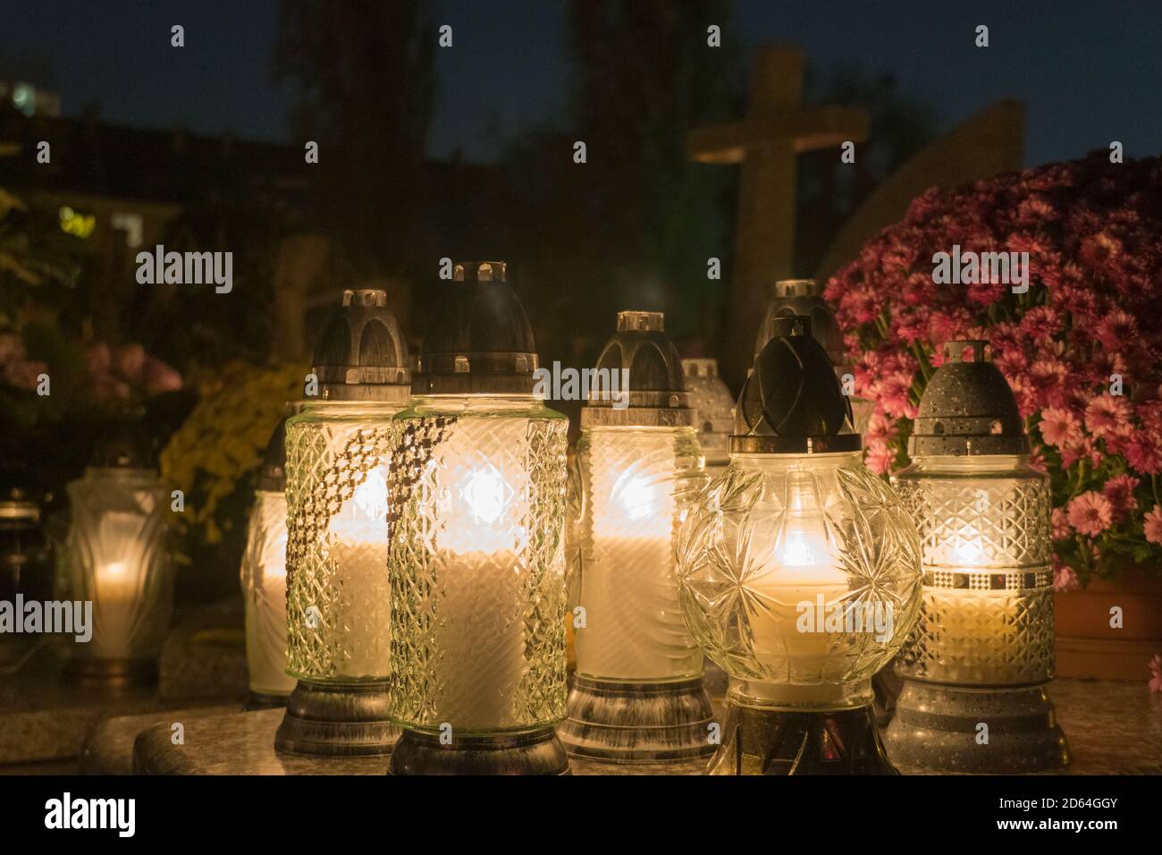 A set of grave candles on catholic cemetery Stock Photo Alamy