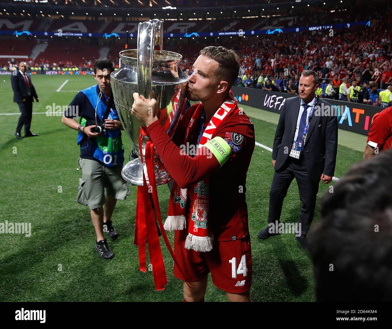 Liverpool's Jordan Henderson celebrates with the trophy after the UEFA Champions League Final at the Wanda Metropolitano, Madrid. Stock Photo