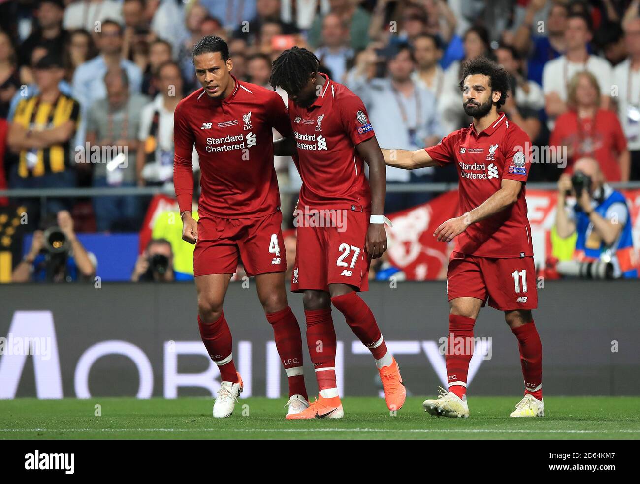 Liverpool S Divock Origi Centre Celebrates With Virgil Van Dijk Left And Mohamed Salah After Scoring His Side S Second Goal Of The Game During The Uefa Champions League Final At The Wanda Metropolitano