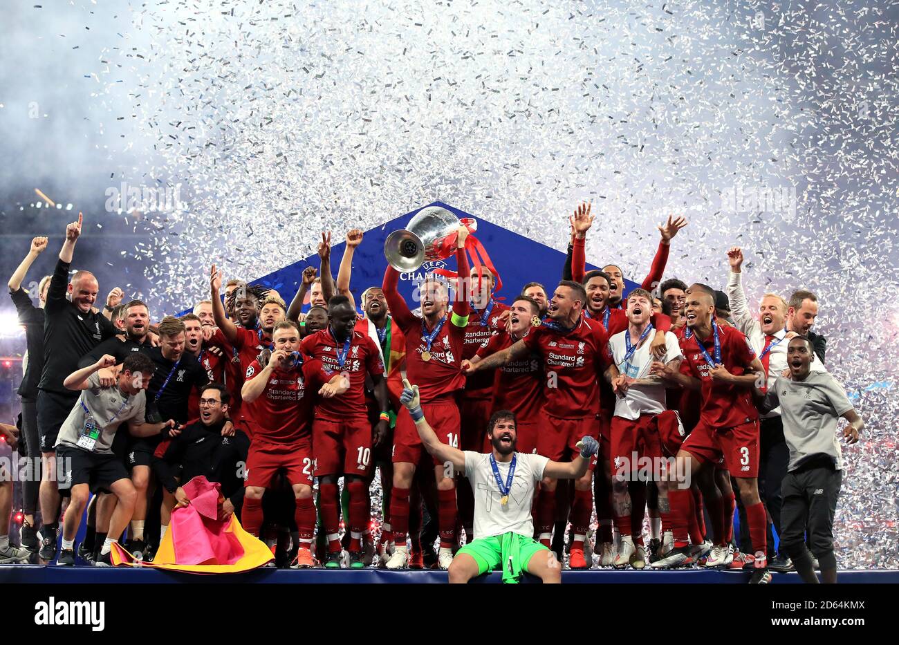 Liverpool players celebrate with the trophy after winning the UEFA Champions League Final at the Wanda Metropolitano, Madrid. Stock Photo