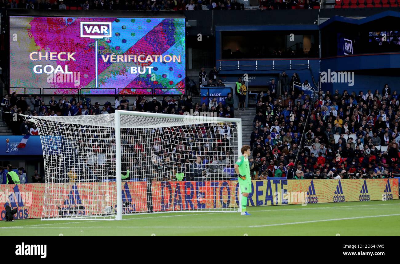 The big screen behind South Korea goalkeeper Kim Minjung shows the VAR is checking a goal by France's Griedge Mbock Bathy (not in picture) before it is ruled out for an offside Stock Photo