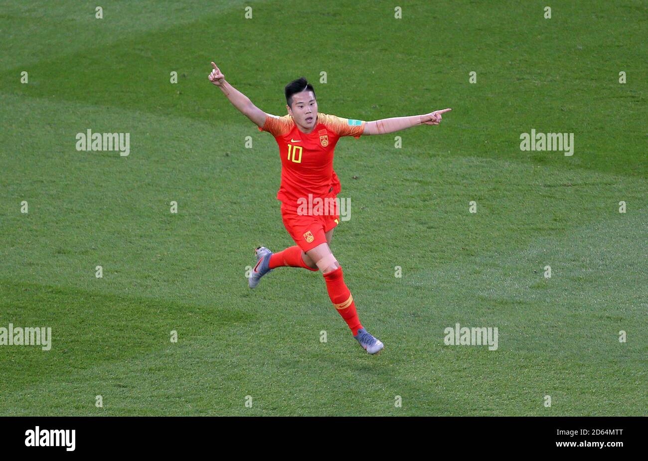 China's Li Ying celebrates celebrates scoring her side's first goal of ...