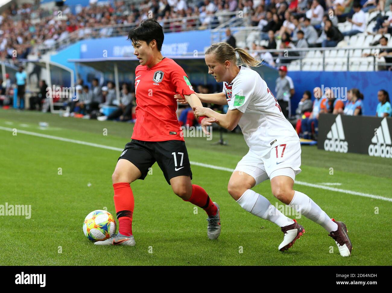 South Korea's Lee Geummin (left) and Norway's Kristine Minde battle for the  ball Stock Photo - Alamy