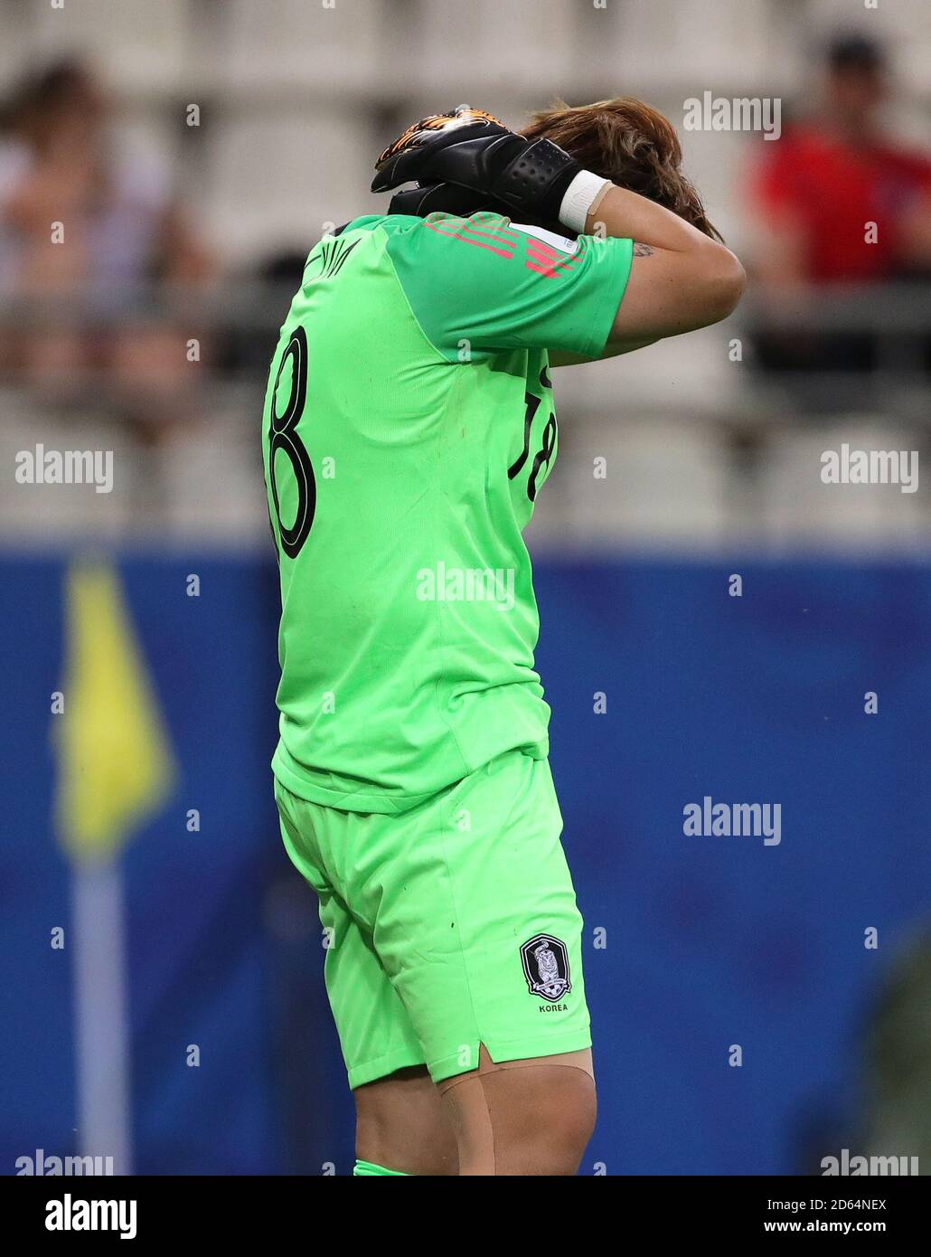 South Korea goalkeeper Kim Minjung looks dejected after Norway's Isabell Herlovsen  (not pictured) scores her sides second goal of the game Stock Photo