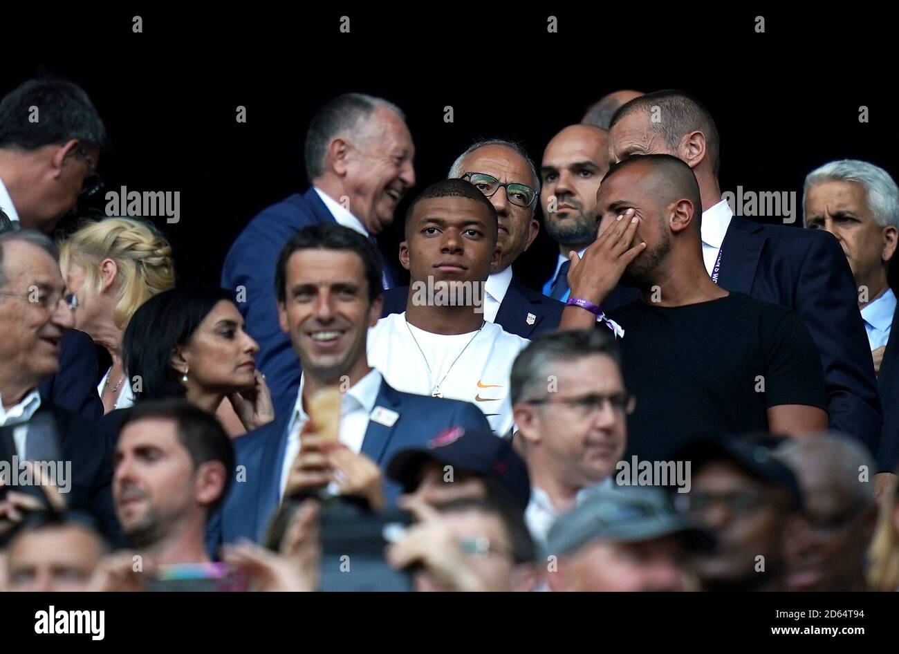 France international footballer Kylian Mbappe (centre) watches on during the game Stock Photo